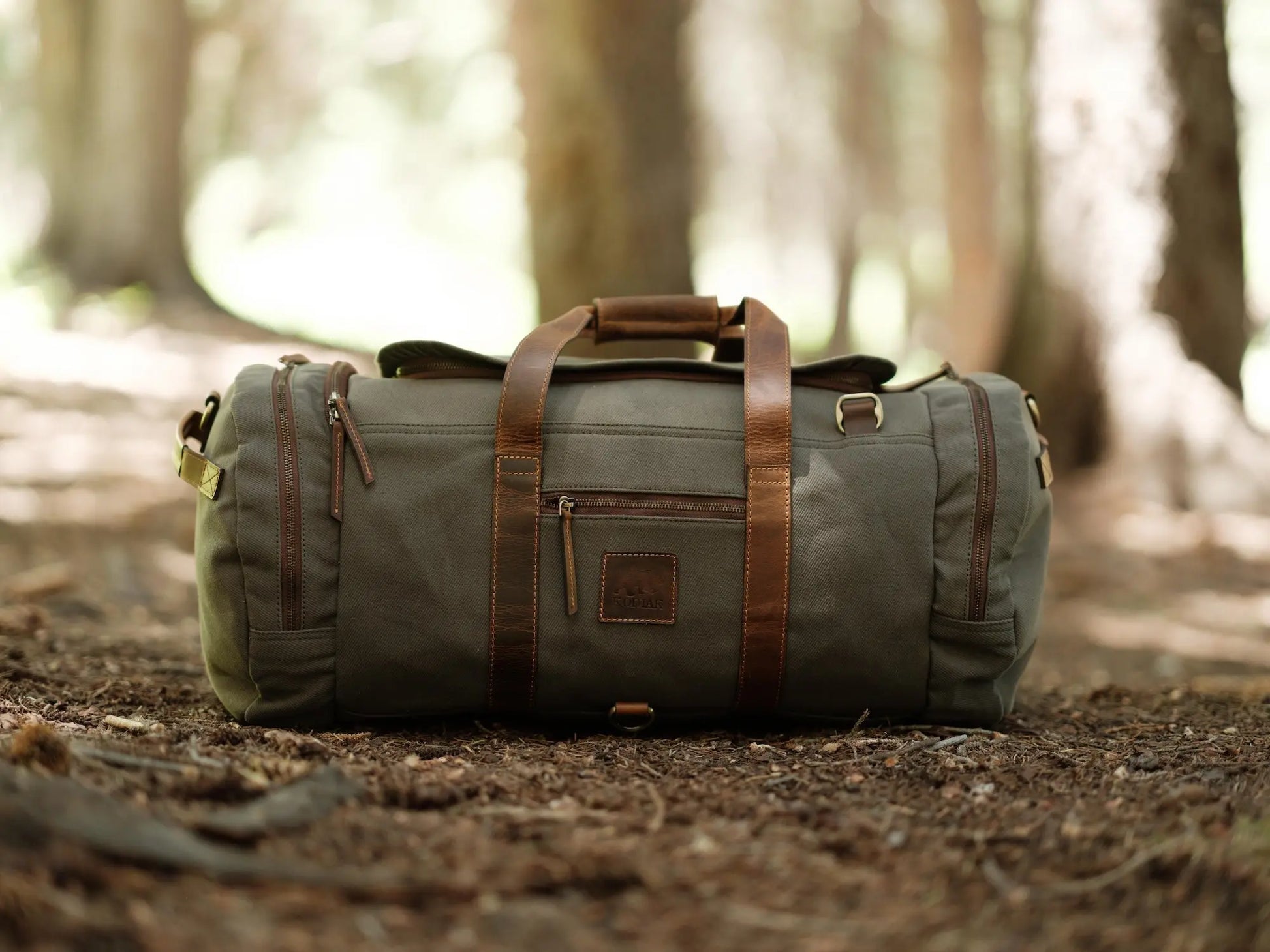 55L Nomad Canvas Duffel Kodiak Leather