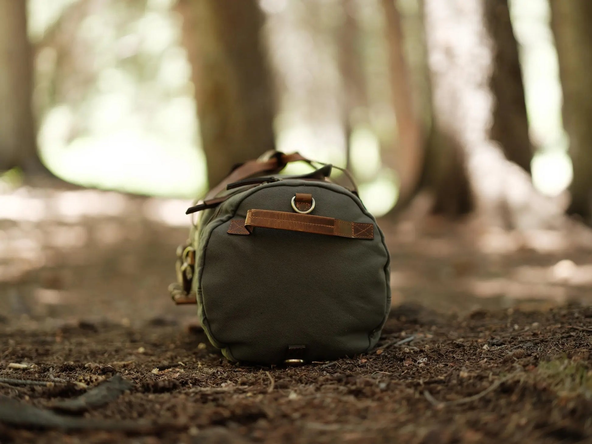 55L Nomad Canvas Duffel Kodiak Leather